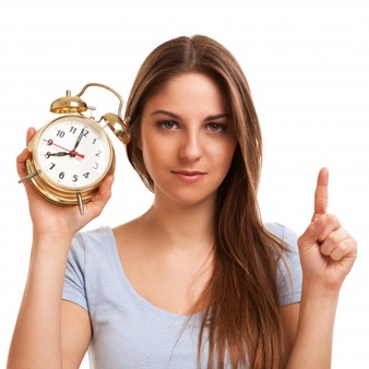 young-caucasian-woman-with-alarm-clock_144627-2336
